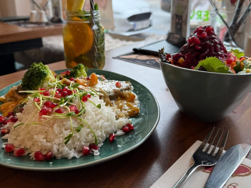 Colourful vegan lunch with rice and salad